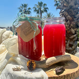 Two jars of Tribal Marks’ and ‘Dami’s Passion Fusion Craft Tea in 32 oz mason jars 