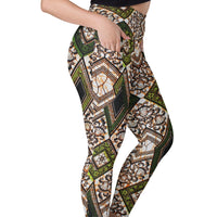 Woman putting hand in pocket of Tribal Marks' NEW The Proverb Ankara Print Leggings with Pockets